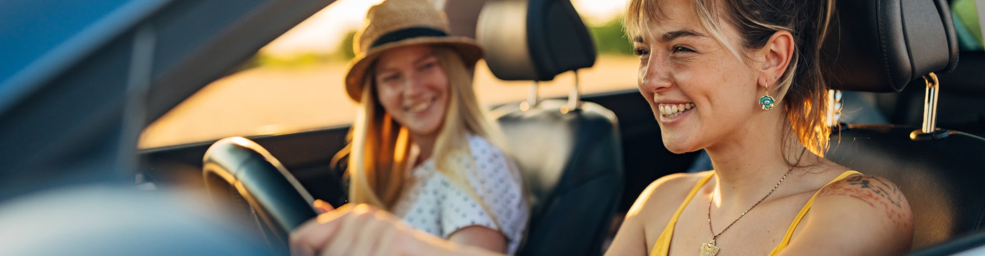 First Time Buyers driving off in their new Nissan
